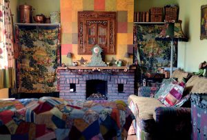 The living room in Corinne Young's home, with furniture embellished by Corinne. Photo by Jonathan Gawthorpe for Yorkshire Post Magazine (June 2014).