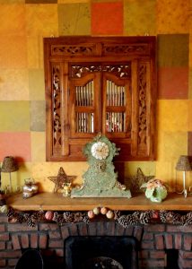 The living room in Corinne Young's home, with furniture embellished by Corinne. Photo by Jonathan Gawthorpe for Yorkshire Post Magazine (June 2014).