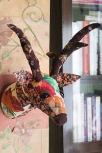 Fabric stag trophy head by textile artist Corinne Young. Photo by Colin Poole for HomeStyle Magazine (June 2016).