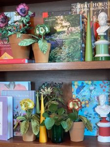 Embroidered pot plant sculptures by textile artist Corinne Young on display in the Library Room, Lanesborough Hotel, London (May 2023).