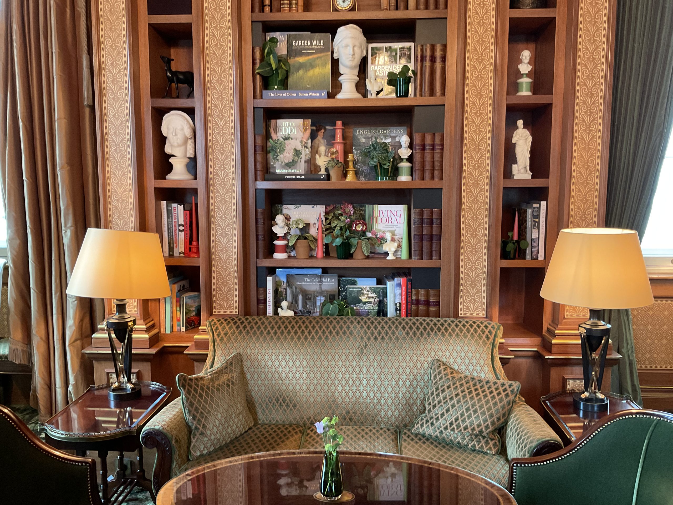 Embroidered pot plant sculptures by textile artist Corinne Young on display in the Library Room, Lanesborough Hotel, London (May 2023).