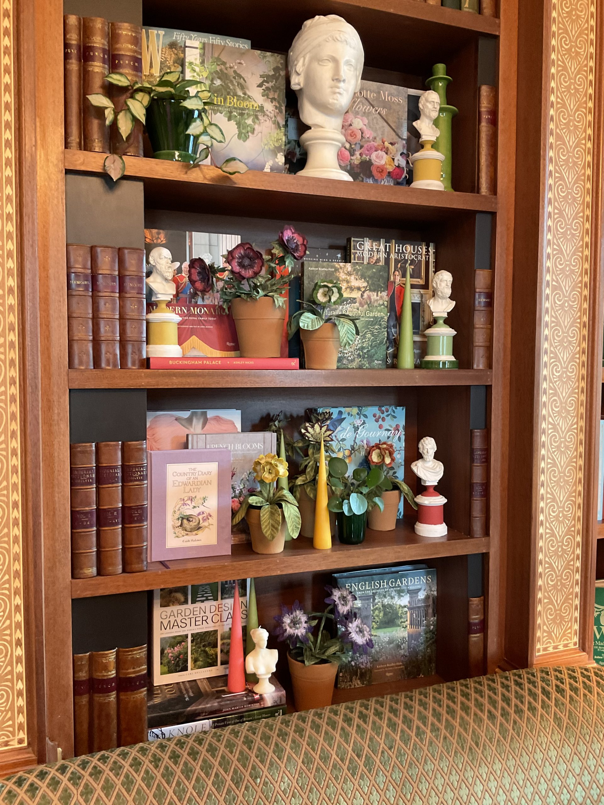 Embroidered pot plant sculptures by textile artist Corinne Young on display in the Library Room, Lanesborough Hotel, London (May 2023).