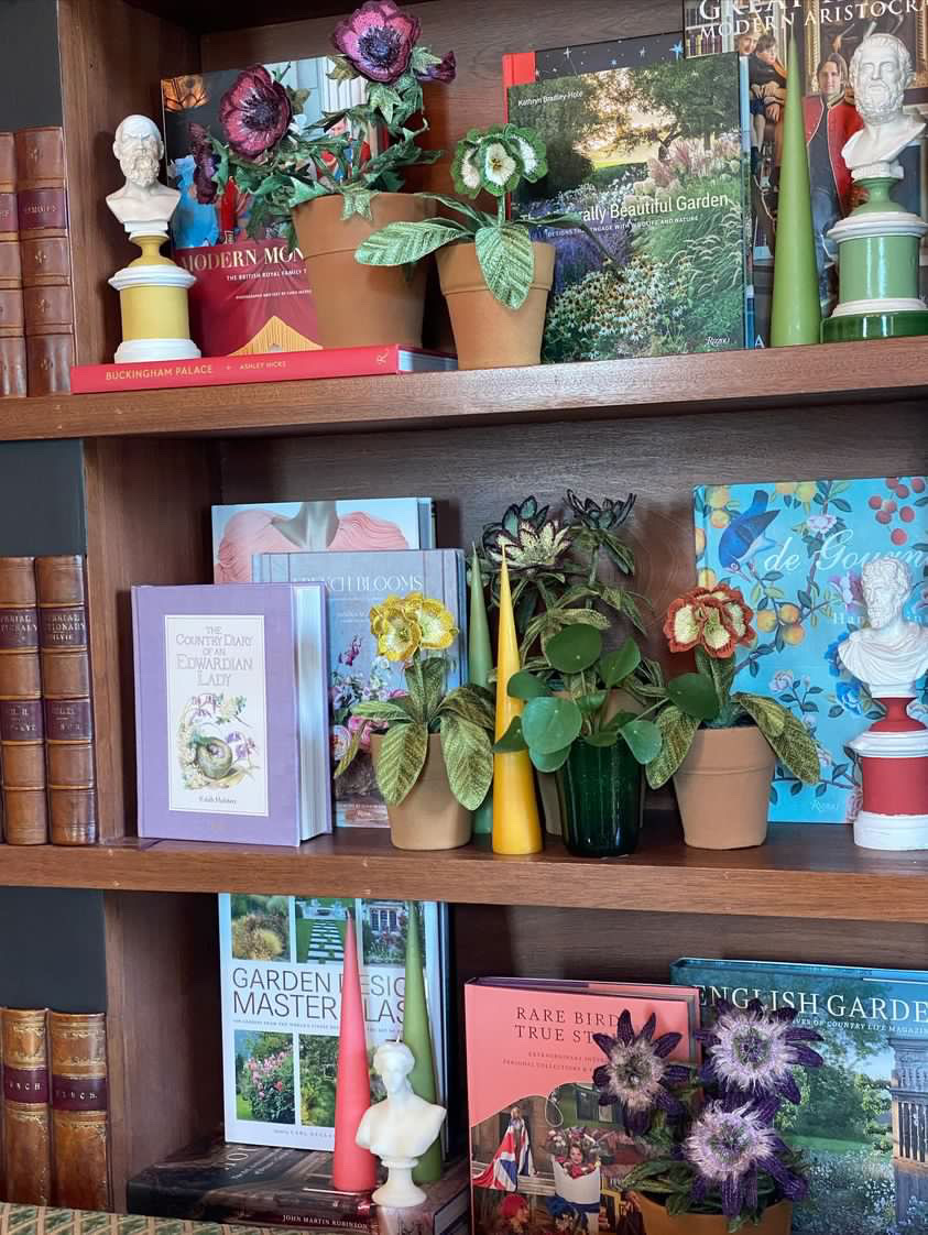 Embroidered pot plant sculptures by textile artist Corinne Young on display in the Library Room, Lanesborough Hotel, London (May 2023).