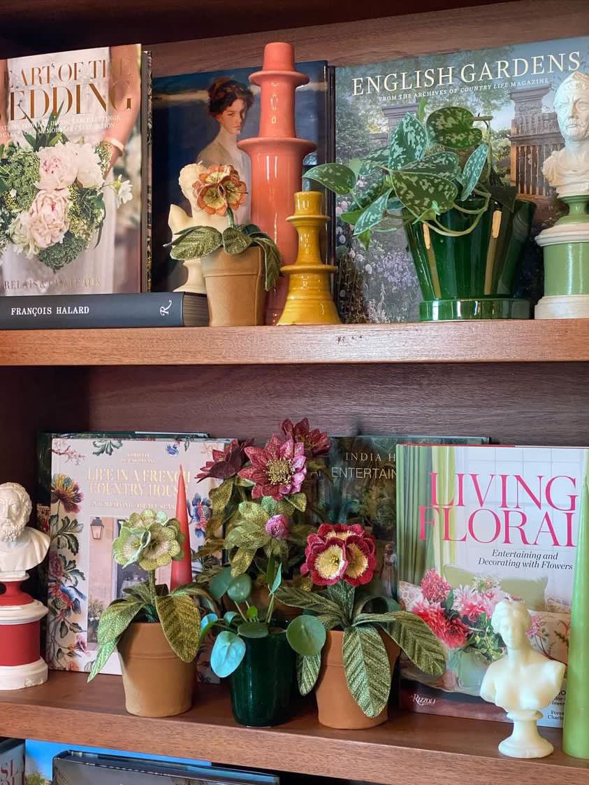 Embroidered pot plant sculptures by textile artist Corinne Young on display in the Library Room, Lanesborough Hotel, London (May 2023).