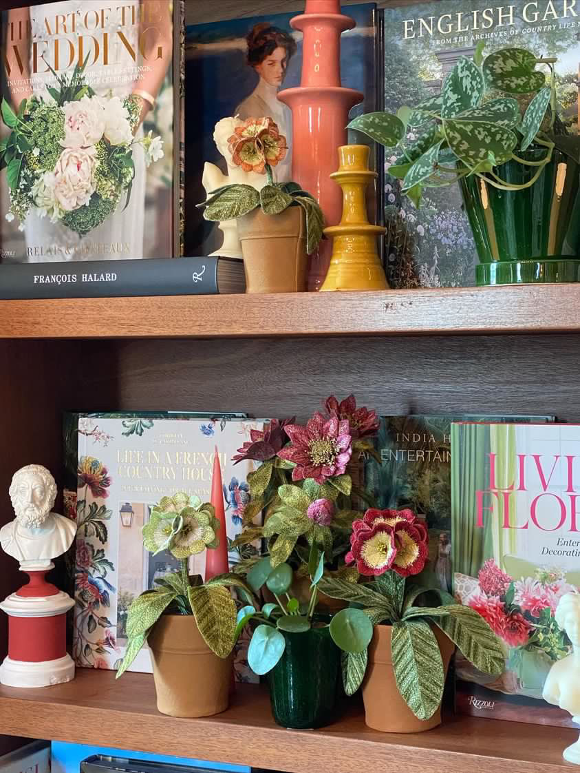 Embroidered pot plant sculptures by textile artist Corinne Young on display in the Library Room, Lanesborough Hotel, London (May 2023).