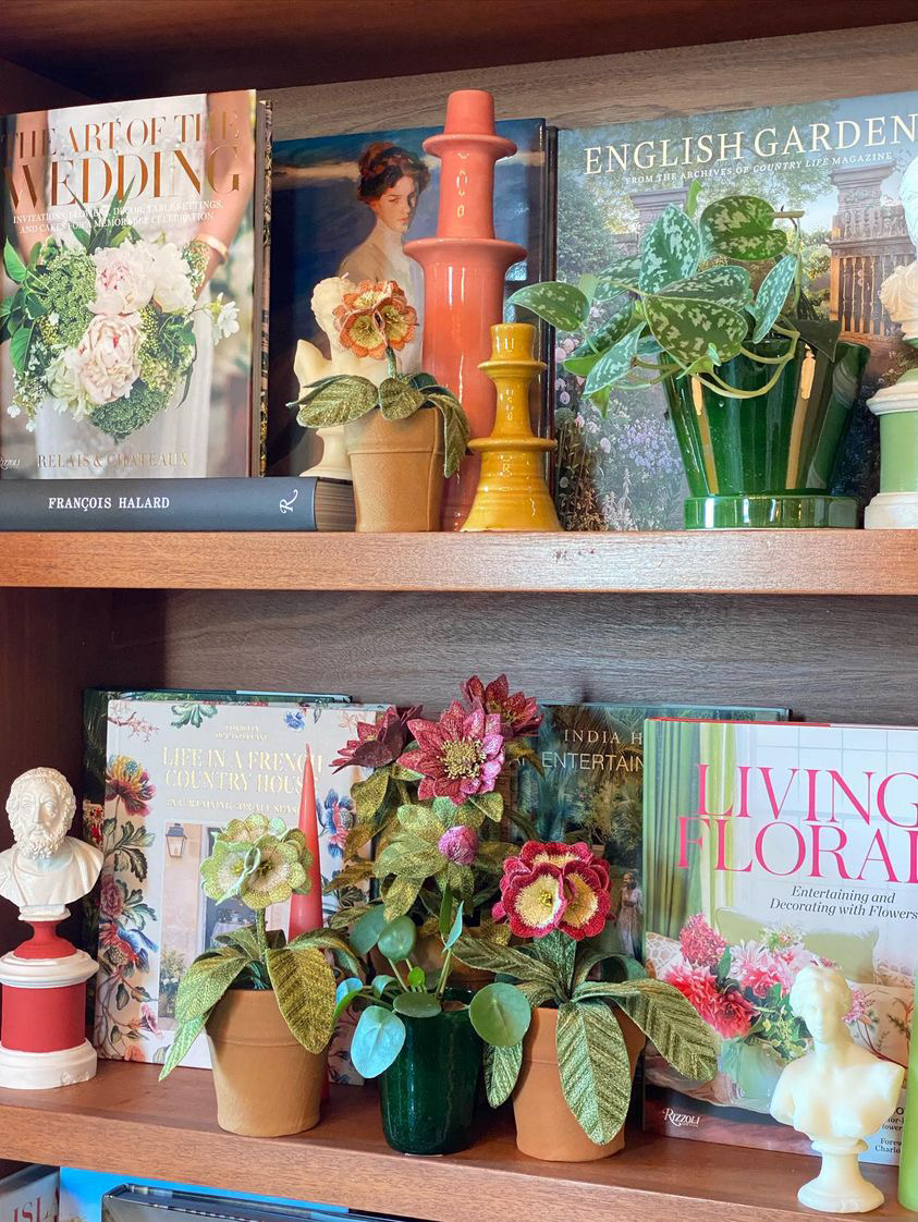 Embroidered pot plant sculptures by textile artist Corinne Young on display in the Library Room, Lanesborough Hotel, London (May 2023).