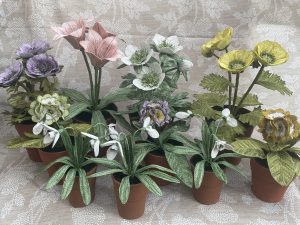 Embroidered pot plants by Corinne Young on display at Bonadea, London.